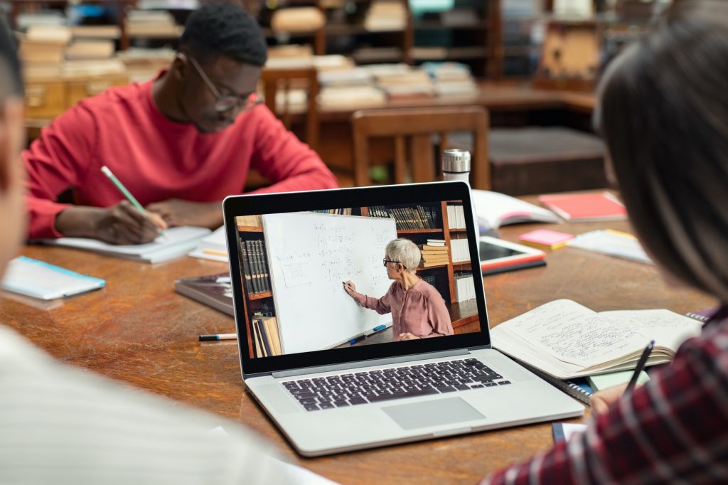 Student watching online video lesson