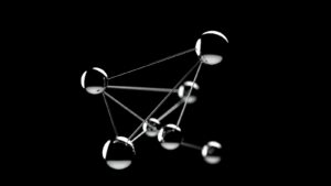 a black and white photo of a network of spheres